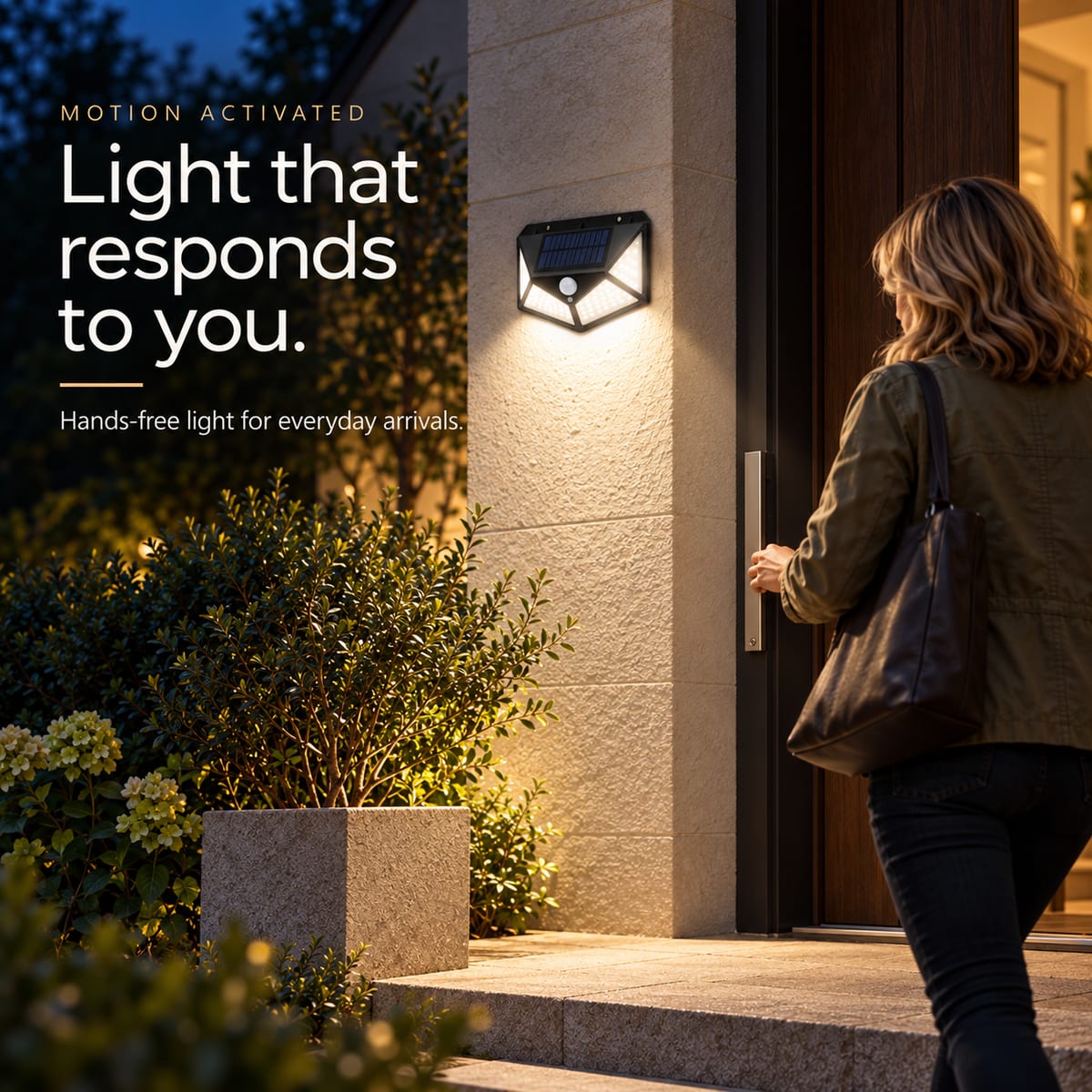 A woman arriving at a doorway illuminated by the solar motion light